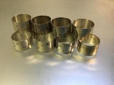 A set of twelve modern silver napkin rings (276g)