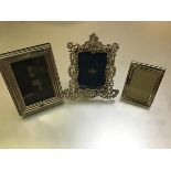 An Epns Goldsmith & Silversmith's Co., Regent Street, chased photograph frame with C scroll and leaf
