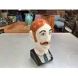 A modern pottery bust of a moustached man by Toni Davidson, with craquelure in the Edwardian