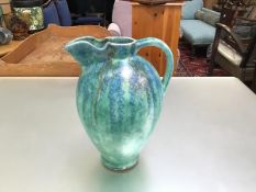 A 1930s turquoise and lapis blue decorated baluster jug with wavy top (slight chip to base) (h.