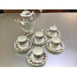 A Coalport china floral May Time pattern, twelve piece coffee set, complete with coffee pot (h.