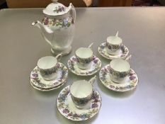 A Coalport china floral May Time pattern, twelve piece coffee set, complete with coffee pot (h.