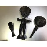 An Ashanti standing ebonised fertility figure, with outstretched arms (h.34cm x 13cm x 5cm), an