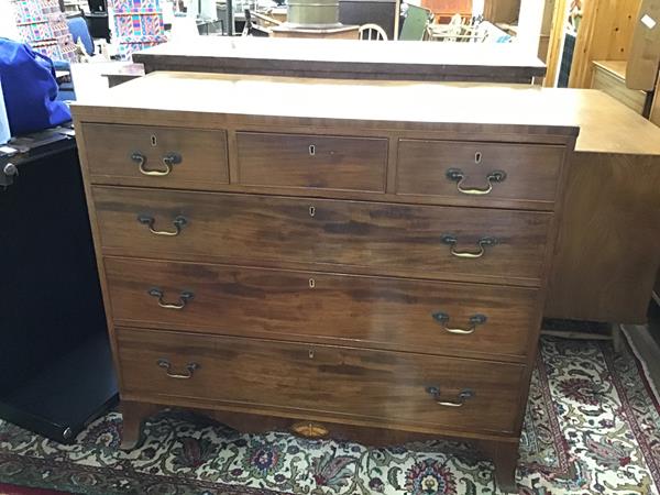 An early 19thc mahogany chest, the rectangular top with crossbanded border and boxwood strung inlays