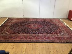 A fine handknotted Iranian wool carpet woven in the region of Kashan, with classic floral design,