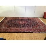 A fine handknotted Iranian wool carpet woven in the region of Kashan, with classic floral design,