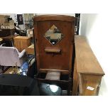 An oak 1930s mirror panel back hallstand with shelf and lift up glove box (h.184cm x 72cm x 30cm)