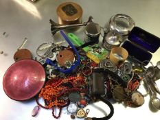 A jewellery box containing miscellaneous bead necklaces, silver part condiment set, wristwatches,