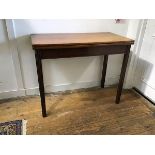 A 19thc mahogany rectangular fold over tea table, with moulded edge and plain frieze, raised on