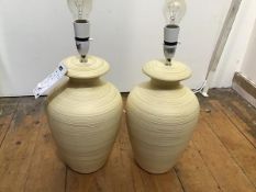 A pair of pottery ribbed baluster table lamps (h.34cm)