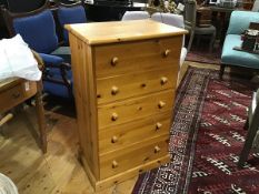 A pine chest, the rectangular top with moulded edge above five long drawers, on plinth base (h.