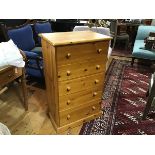 A pine chest, the rectangular top with moulded edge above five long drawers, on plinth base (h.