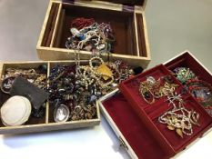 Two jewellery boxes containing a large collection of costume jewellery including bead necklaces,