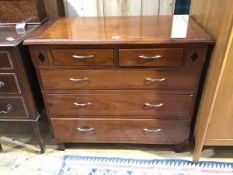 A hardwood chest, the rectangular top above two short and three long drawers, on square supports (