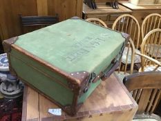 A leather and canvas bound trunk with stencilled Surgeon Lieutenant G.M Flett, Royal Navy