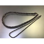 A white metal woven spiral chain necklace with adjustable centre barrel and terminals (18cm) and
