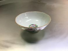 A Chinese porcelain bowl, possibly Republic period, painted to the exterior with lotus and