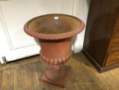 A painted iron campana form garden urn. 62cm by 48cm