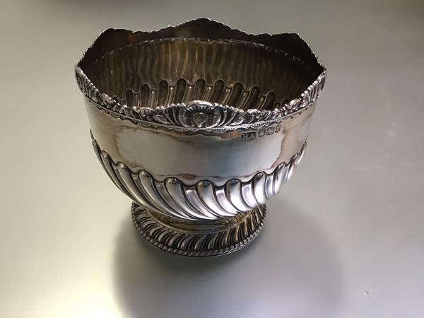 A late Victorian silver rose bowl, Atkin Brothers, Sheffield 1894, with shell-cast rim, half-