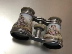 A pair of late 19th century mother-of-pearl mounted painted porcelain opera glasses, probably