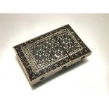 An Anglo-Indian ivory and sandalwood Sadeli ware card case, c. 1900, of characteristic form with