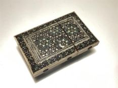 An Anglo-Indian ivory and sandalwood Sadeli ware card case, c. 1900, of characteristic form with