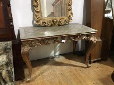 A giltwood side table in mid-18th century style, the rectangular parquetry top above a pierced