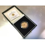 A Royal Mint 1995 gold proof Two Pounds coin, cased with certificate no. 1492.