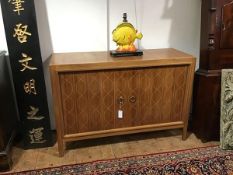 David Booth and Judith Ledeboer for Gordon Russell Ltd, a 1950's "Helix" sideboard, with incised