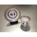 A Chamberlain's Worcester armorial cup and saucer, c. 1815/20, Baden shape, the coat of arms with