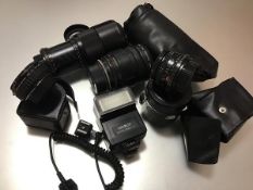 A group of lenses etc comprising: a Minolta MD 35mm 4/2.8; a Minolta MD75-200mm F/4.5; a Tamron 28-