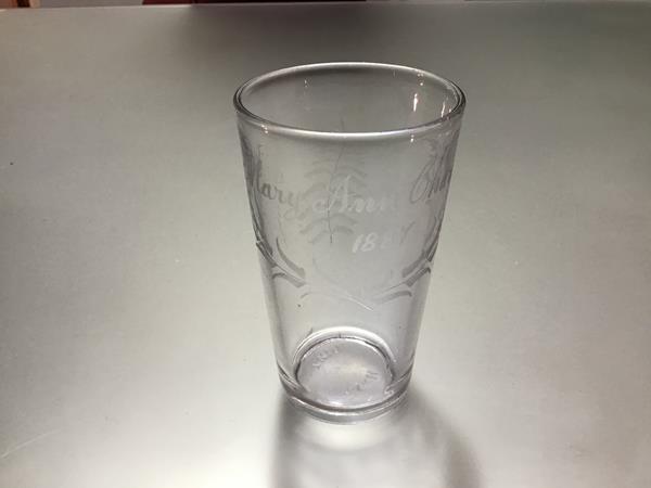 A Victorian half-pint glass tumbler acid etched "Mary Ann Charlton / 1887" and with a fern verso.