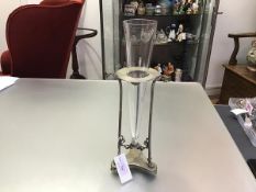 A late 19th century silver-plate and glass vase, the conical glass vessel in a tripod stand, the