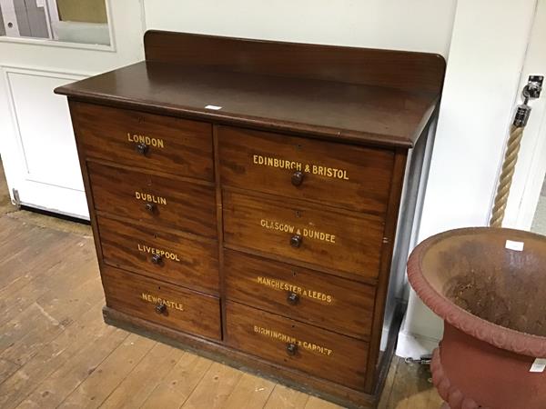 An unusual 19th century mahogany commercial chest of drawers, the rectangular top with backboard