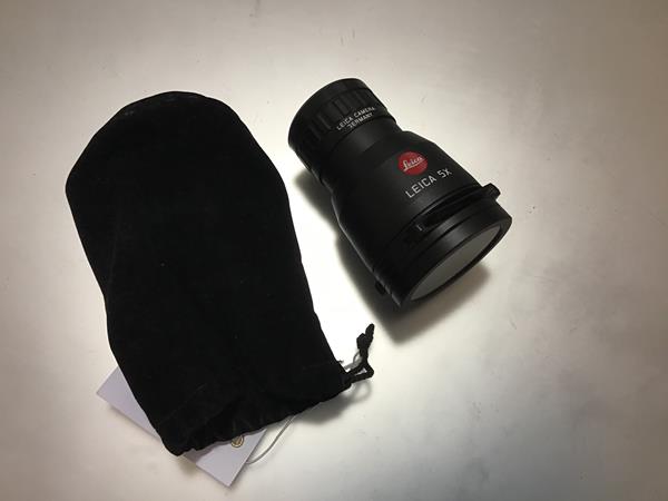 A Leica sliding lens - Universal Magnifier 5 X (slide viewer)