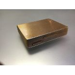 A George VI 18ct gold cigarette case, W.H. Manton Ltd, Birmingham 1941, of rectangular form,