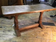 A Robert Thompson of Kilburn "Mouseman" 3' oak coffee table, c. 1990, the rectangular adzed top