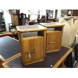 A pair of 1940's oak bedside cabinets by Abbess, each with rectangular top with rounded corners over