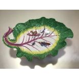 A Chelsea leaf dish, c. 1755-60, with puce veining and green enamelled rim, painted to the well with