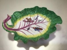 A Chelsea leaf dish, c. 1755-60, with puce veining and green enamelled rim, painted to the well with