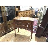 A Louis XVI style brass-mounted mahogany work table, the rectangular crossbanded hinged top