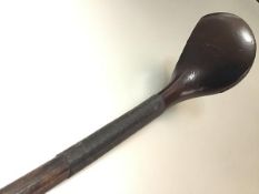 A hickory shafted golf club, c. 1900, signed "D.M. Patrick, Special". Length 116cm