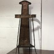An Arts & Crafts copper and wrought-iron stick stand, c. 1900, the tapering hammered copper rear