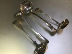 A group of four 19th century Scottish silver sauce ladles comprising: a pair, Alexander Coghill,