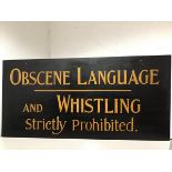A double-sided painted wooden sign "Obscene Language / and Whistling / Strictly Prohibited" to