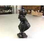 After the Antique, a patinated bronze desk bust of Athena, on an integral socle. 21cm