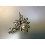 A striking vintage diamond and cultured pearl brooch, of spray design, set in 14ct white gold with