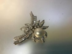 A striking vintage diamond and cultured pearl brooch, of spray design, set in 14ct white gold with