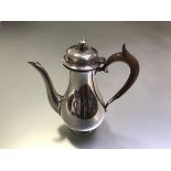A George V silver coffee pot, Edward Barnard & Sons Ltd., London 1916, in early 18th century
