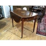 A George III satinwood crossbanded and inlaid mahogany Pembroke table, c. 1800, of characteristic